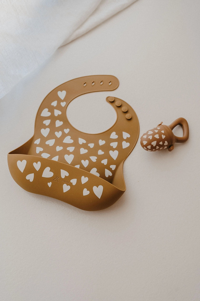 Bavaglino in silicone Cuori Camel
